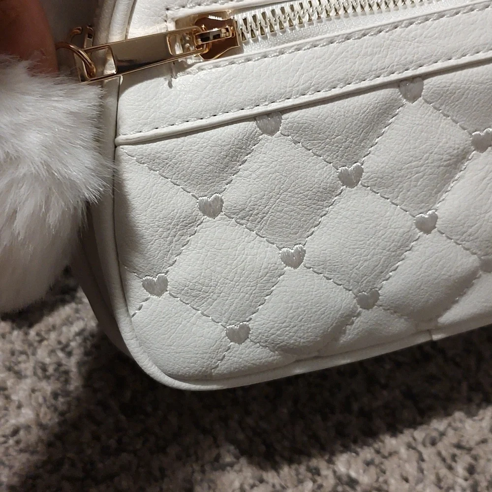 Girls white backpack with Pom